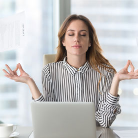 Woman at Computer Meditating
